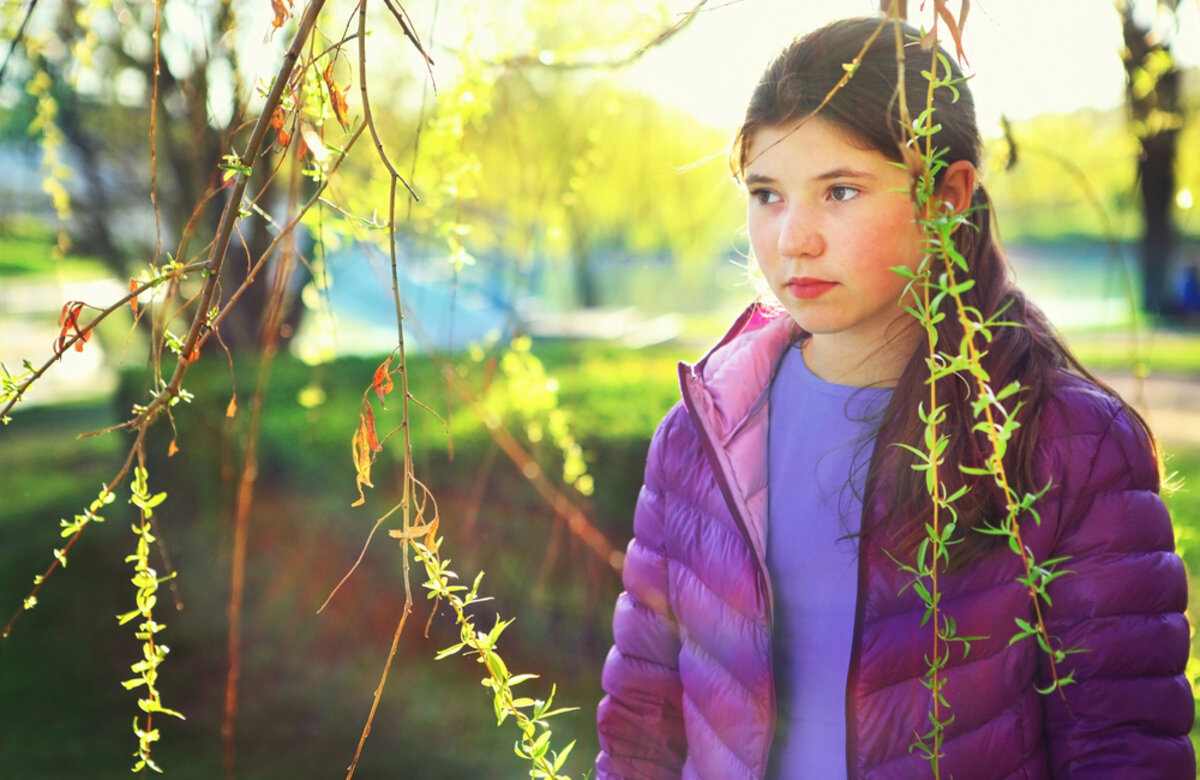thoutful portrait of teenager beautiful girl on th